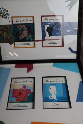 une photo d'une vitrine sur laquelle sont affichées des photos de personnes