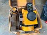 a yellow box that has a yellow and black electronic device in it