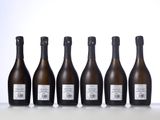 six bottles of wine lined up against a white background