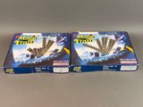 Deux boîtes de « Magic Train » sont posées sur une table.