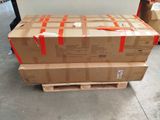 a stack of boxes sitting on a pallet in a warehouse