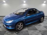 a picture of a blue car on a checkered floor