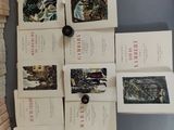 a lot of books that are on a table