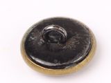 a close up of a button on a white surface
