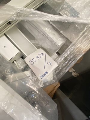 a pile of electronic equipment wrapped up in plastic