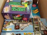 boxes of toys are stacked on top of each other in a cardboard box
