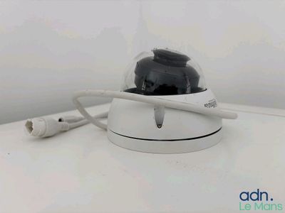 an image of a camera with a cord attached to it