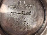 an antique silver plate with the name of the international silver plate company on it