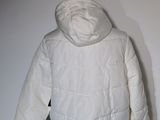 a white jacket on a mannequin mannequin mannequin mannequin mannequin mannequin mannequin mannequin mann