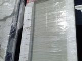 two mattresses that are wrapped up and ready to be shipped