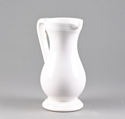an image of a white pitcher on a gray background