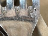 a fork that is sitting on top of a napkin