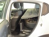 a car that has a seat in the back of it