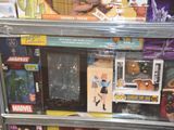 a display case full of action figures in a toy store
