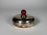 an image of a silver box with a red ball on top of it