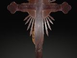 an image of a wooden cross on a black background