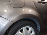 a close up of a car door handle on the side of the car