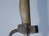 a close up of a knife with a handle