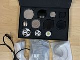 a box with a pair of shoes and a pair of headphones