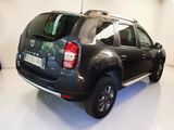 a picture of a grey dacia parked in a garage