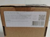 an open box with a label on it sitting on a table