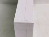 a close up of a white box on a table