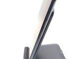 a cell phone that is sitting on top of a stand