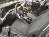 a car that has a steering wheel and a seat in it