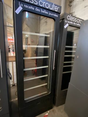 a glass door that is open in a building