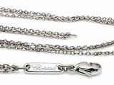 a silver chain with a name tag attached to it