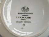 a white plate with a black and white design on it