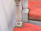 two chairs that are sitting next to each other