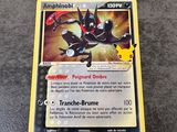 a close up of a pokemon card sitting on top of a table