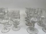 a lot of empty wine glasses sitting on a table