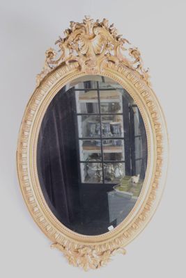 Miroir médaillon biseauté. XIXe siècle.