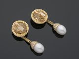 a pair of cultured pearl and diamond earrings