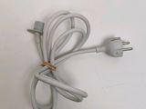 a white cord that is connected to an electrical plug