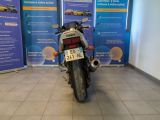 a motorcycle that is parked in a showroom