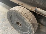 a close up of a tire on the side of a truck
