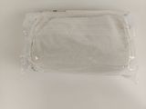 a bag of white cloth sitting on a white surface