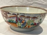 a bowl that has a picture of a group of people on it