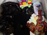 a pile of toys and other items in a bin