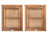pair of antique wooden picture frames with glass inserts