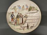 a plate with a picture of a man and a woman on it