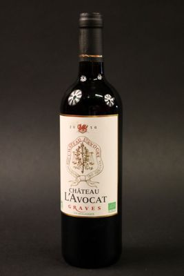 a bottle of wine that is sitting on a table