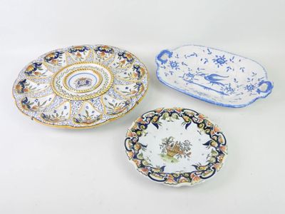 three plates with different designs on them sitting on a white surface
