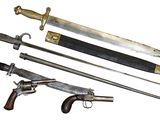 several different types of weapons are displayed on a white surface