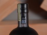 a bottle of wine that is sitting on a table