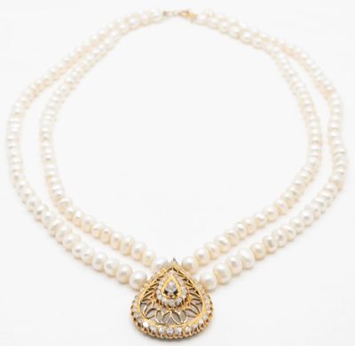Collier en 2 rangs de perles de culture, agrémenté d'un pend…
