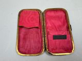two open suitcases that are sitting on a table